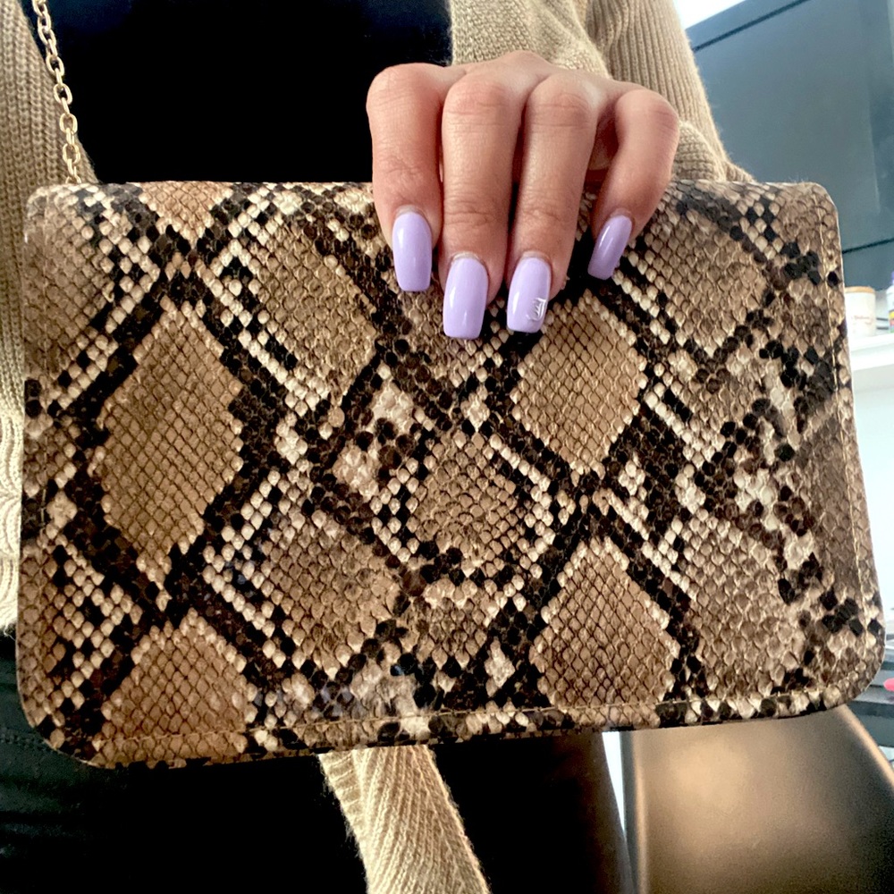 Crossover faux snake print bag